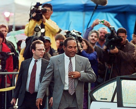 OJ SIMPSON LEONARD O.J. Simpson leaves Los Angeles County Superior court in Santa Monica, Calif., after testifying in the wrongful death civil trial against him. At left is defense attorney Daniel Leonard
SIMPSON, SANTA MONICA, USA