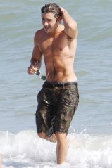 Zac Efron
Ashley Tisdale celebrates her 26th birthday on the beach, Malibu, Los Angeles, America - 02 Jul 2011
Ashley Tisdale celebrates her 26th birthday with friends and went for a dive at the ocean with Zac Efron and after realizing that a swarm of over fifty photographers were running into their direction to photograph them, she ran back to the house laughing hard with Zac.