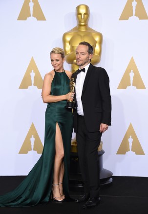 Rachel McAdams, left, poses in the press room with Emmanuel Lubezki, winner of the award for best cinematography for â?œThe Revenantâ??, at the Oscars, at the Dolby Theatre in Los Angeles
88th Academy Awards - Press Room, Los Angeles, USA