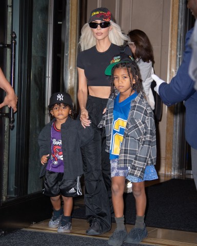 Kim Kardashian leaves her New York City hotel with two of her kids, Saint and Psalm West.Pictured: Psalm West,Kim Kardashian,Saint WestRef: SPL5320772 220622 NON-EXCLUSIVEPicture by: WavyPeter / SplashNews.comSplash News and PicturesUSA: +1 310-525-5808London: +44 (0)20 8126 1009Berlin: +49 175 3764 166photodesk@splashnews.comWorld Rights