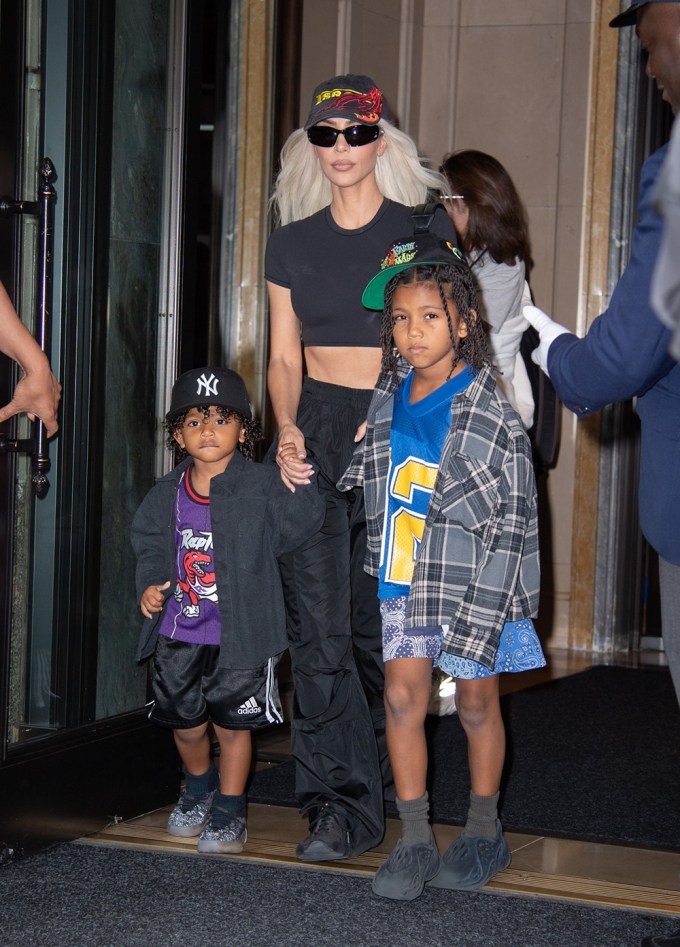 Kim Kardashian Leaves Her New York City Hotel With Two Of Her Kids