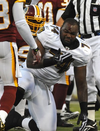 Baltimore Ravens' tackle Michael Oher comes up with a bloody face during the first quarter against the Washington Redskins at M & T Bank Stadium in Baltimore on August 13, 2009.
NFL Redskins Ravens, Baltimore, Maryland - 14 Aug 2009