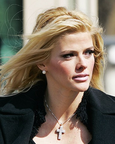 SMITH Anna Nicole Smith, leaves the U.S. Supreme Court, in Washington. With an oil fortune on the line, former stripper Anna Nicole Smith encountered a sympathetic audience at the Supreme Court on Tuesday
SCOTUS PLAYMATES BATTLE, WASHINGTON, USA