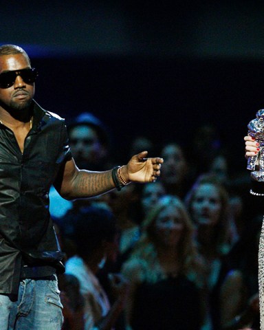 Singer Kanye West takes the microphone from singer Taylor Swift as she accepts the "Best Female Video" award during the MTV Video Music Awards in New York. Swift may have ended her feud with Katy Perry but the one with Kanye West seems simply not to want to die. New leaked video clip of the entire four-year-old phone call between the rapper and pop superstar about his controversial song "Famous" have been posted online and further complicate the picture of what happened Kanye West Taylor Swift, New York, United States - 13 Sep 2009