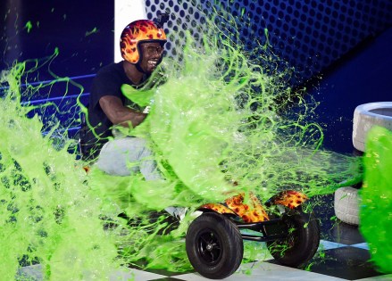 NFL football player Von Miller is "slimed" as he rides a pedal go cart bike during the 2016 Kids' Choice Sports Awards at Pauley Pavilion, in Los Angeles
2016 Kids' Choice Sports Awards - Show, Los Angeles, USA - 14 Jul 2016