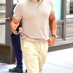 Alex Rodriguez leaves Katie Holmes' apartment building in a bicep-hugging polo shirt and million dollar smile!