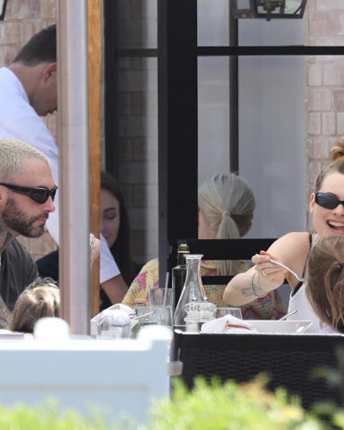 Pacific Palisades, CA  - *EXCLUSIVE* Adam Levine takes model wife Behati Prinsloo and their kids out for lunch at Angelini Ristorante in Pacific Palisades.  Pictured: Adam Levine, Behati Prinsloo  BACKGRID USA 21 JUNE 2022   USA: +1 310 798 9111 / usasales@backgrid.com  UK: +44 208 344 2007 / uksales@backgrid.com  *UK Clients - Pictures Containing Children Please Pixelate Face Prior To Publication*