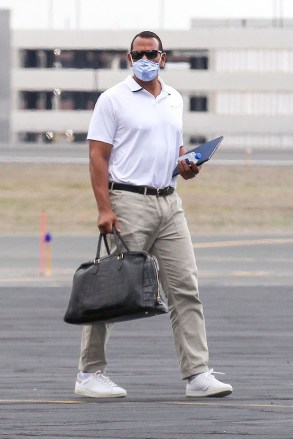 Hartford, CT  - *EXCLUSIVE*  - Alex Rodriguez was spotted deplaning from his private jet in Hartford as he made his way towards the ESPN studios for Sunday Night Baseball. Alex is looking sharp and suited up for business wearing a nice polo and beige slacks for the occasion. Looks like A-Rod is keeping busy amid recent split from now ex-fiancee Jennifer Lopez.Pictured: Alex RodriguezBACKGRID USA 18 APRIL 2021 BYLINE MUST READ: Patriot Pics / BACKGRIDUSA: +1 310 798 9111 / usasales@backgrid.comUK: +44 208 344 2007 / uksales@backgrid.com*UK Clients - Pictures Containing ChildrenPlease Pixelate Face Prior To Publication*