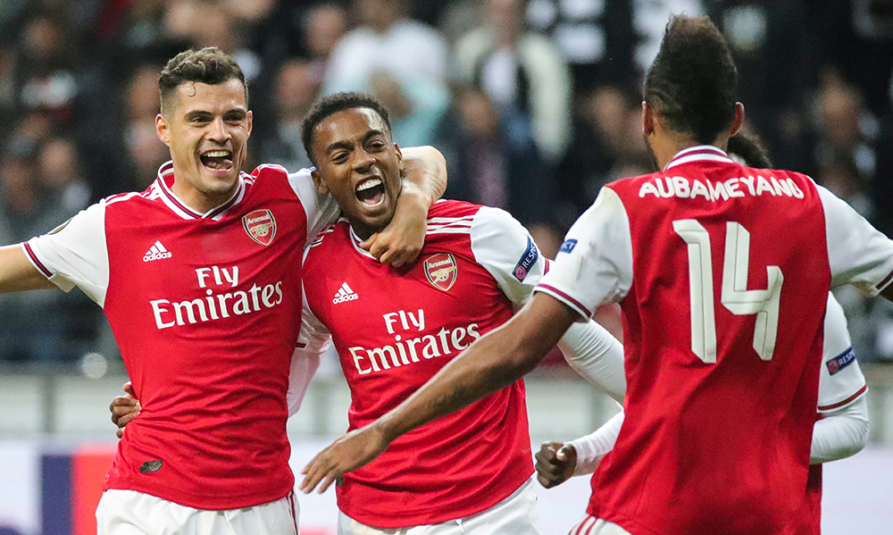 Arsenal's Joe Willock (C) celebrates with teammates Granit Xhaka (L) and Pierre-Emerick Aubameyang (R) after scoring the opening goal during the UEFA Europa League Group F match between Eintracht Frankfurt and Arsenal FC in Frankfurt Main, Germany, 19 September 2019.
Eintracht Frankfurt vs Arsenal F.C., Frankfurt Main, Germany - 19 Sep 2019