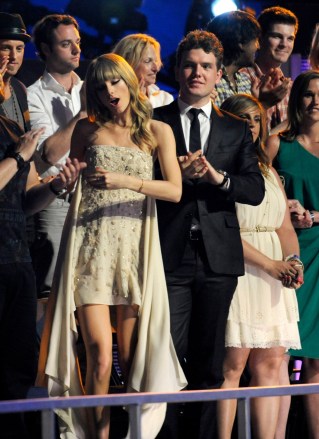 Taylor Swift, left, and Austin Swift dance in the audience at the 2013 CMT Music Awards at Bridgestone Arena, in Nashville, Tenn
2013 CMT Music Awards - Show, Nashville, USA