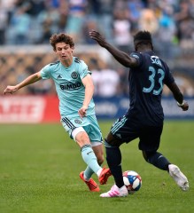 Philadelphia Union's Brenden Aaronson, left, plays the ball against Montreal Impact's Bacary Sagna during the first half of an MLS soccer match, in Chester, Pa
MLS Impact Union Soccer, Chester, USA - 20 Apr 2019