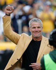 Former Green Bay Packers' Brett Favre acknowledges the crowd during a halftime ceremony of an NFL football game against the Dallas Cowboys, in Green Bay, Wis
Cowboys Packers Football, Green Bay, USA - 16 Oct 2016