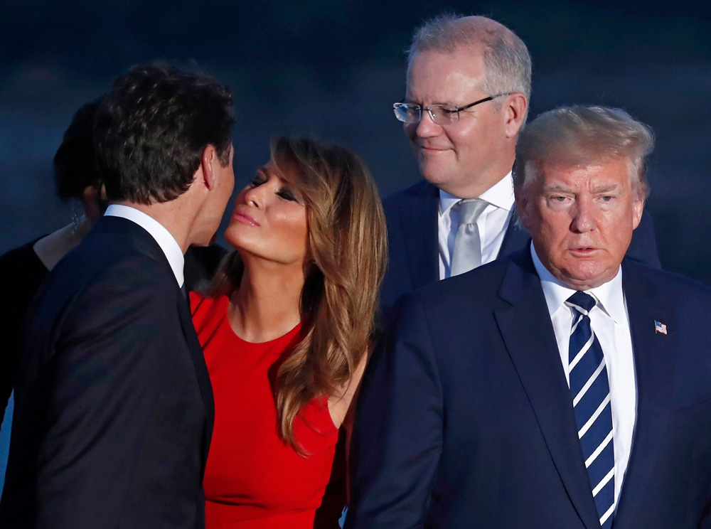 Canadian Prime Minister Justin Trudeau (L) hugs US First Lady Melania Trump (2-L) as US President Donald J. Trump (R) and Australian Prime Minister Scott Morrison (2-R)  looks on as they attend the family photo during the G7 summit at Casino in Biarritz, France, 25 August 2019. The G7 Summit runs from 24 to 26 August in Biarritz.
G7 Summit Biarritz in France, Bayonne - 25 Aug 2019