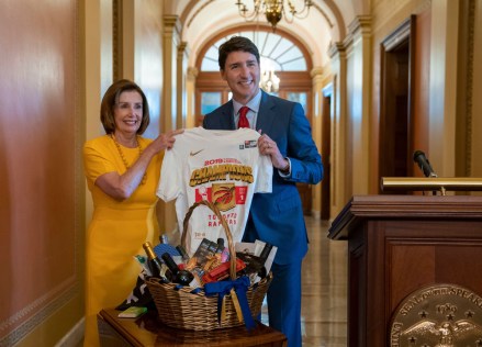 Nancy Pelosi, Justin Trudeau. Speaker of the House Nancy Pelosi, D-Calif., and Canadian Prime Minister Justin Trudeau exchange gifts as they settle a wager over the recent NBA basketball championship game between her Golden State Warriors and his victorious Toronto Raptors, at the Capitol in Washington
US Canada, Washington, USA - 20 Jun 2019