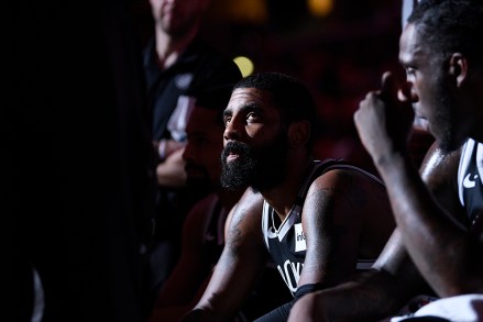 Brooklyn Nets guard Kyrie Irving (11) listens during a time out in the second half of an NBA basketball game against the Washington Wizards, Saturday, Feb. 1, 2020, in Washington. The Wizards won 113-107. (AP Photo/Nick Wass)