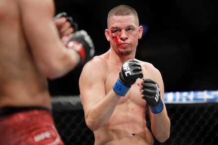 Nate Diaz, right, fights Jorge Masvidal during the first round of a welterweight mixed martial arts bout at UFC 244 early, in New York. Masvidal stopped Diaz in the fourth round
UFC 244 Mixed Martial Arts, New York, USA - 03 Nov 2019