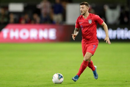 Paul Arriola of the United States tackles Cuba in the second half of the CONCACAF Nations League soccer match, in Washington.  US wins 7-0 CONCACAF Cuba US Soccer, Washington, USA - 11 Oct 2019