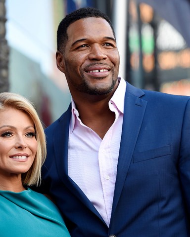 Kelly Ripa, left, poses with Michael Strahan, her co-host on the daily television talk show "LIVE! with Kelly and Michael," during a ceremony honoring Ripa with a star on the Hollywood Walk of Fame in Los Angeles. Strahan says goodbye to his daytime talk show with Kelly Ripa, an exit accelerated by awkwardness surrounding the announcement of his new job at "Good Morning America
TV-ABC Strahan, Los Angeles, USA