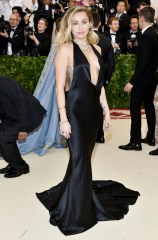 Miley Cyrus attends The Metropolitan Museum of Art's Costume Institute benefit gala celebrating the opening of the Heavenly Bodies: Fashion and the Catholic Imagination exhibition, in New York2018 MET Museum Costume Institute Benefit Gala, New York, USA - 07 May 2018