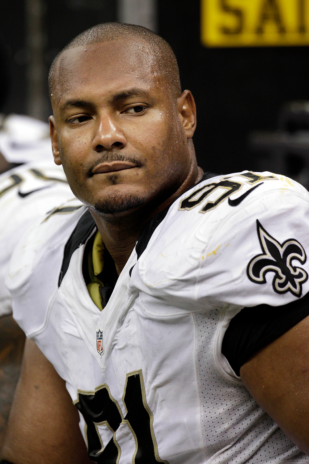 New Orleans Saints defensive end Will Smith sits on the bench in the second half of an NFL football game against the Washington Redskins at the Mercedes-Benz Superdome in New Orleans
Redskins Saints Football, New Orleans, USA - 9 Sep 2012