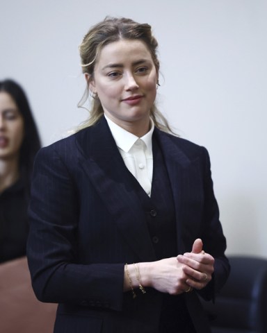 Actor Amber Heard arrives in the courtroom at the Fairfax County Circuit Court in Fairfax, Va.,. Actor Johnny Depp sued his ex-wife Amber Heard for libel in Fairfax County Circuit Court after she wrote an op-ed piece in The Washington Post in 2018 referring to herself as a "public figure representing domestic abuse
Depp Heard Lawsuit, Fairfax, United States - 21 Apr 2022