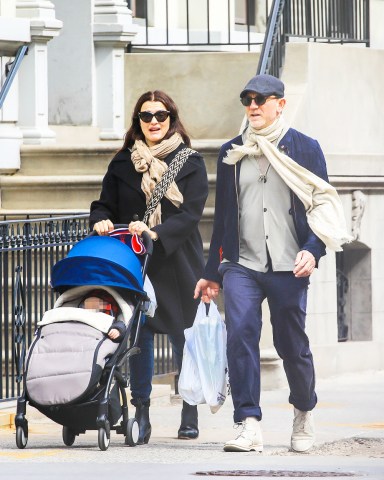 EXCLUSIVE: Daniel Craig is seen spending quality time with his wife Rachel Weisz and their baby daughter, as Daniel took time off from filming to be with his family. The family were seen having a breakfast before they took a walk around New York's East Village neighbourhood and bought some groceries home. **PLEASE NOTE: child's face has been pixelated**. 04 Apr 2019 Pictured: Rachel Weisz, Daniel Craig. Photo credit: MEGA TheMegaAgency.com +1 888 505 6342 (Mega Agency TagID: MEGA394746_003.jpg) [Photo via Mega Agency]