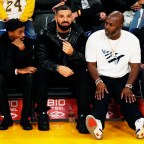 Rapper Drake Wearing A 5.5 Million Dollar Richard Mille Watch That He Bought For His Birthday As He Attends The Game Between The Houston Rockets And The LA Lakers