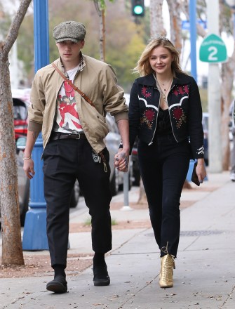 Brooklyn Beckham takes his girlfriend Chlo�race Moretz out for her birthday in West Hollywood. The Two were beaming as they waved through west Hollywood, Chloe wore a Western Jacket, and Gold boots, accessorized with a Tiara, while Brooklyn kept it casual in a tan jacket, black slacks and a Rock shirt.Pictured: Brooklyn Beckham, Chlo�race MoretzRef: SPL1653540  100218  Picture by: Mark Kreusch / Splash NewsSplash News and PicturesLos Angeles:310-821-2666New York:212-619-2666London:870-934-2666photodesk@splashnews.com