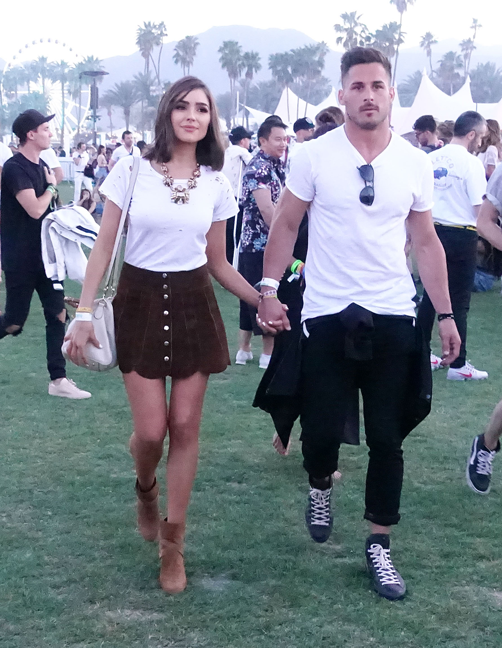 Former Miss Universe, Olivia Culpo flashed her toned legs while holding hands with her NFL beau Danny Amendola as they enjoyed the music at the Coachella Music Festival during the first weekend.