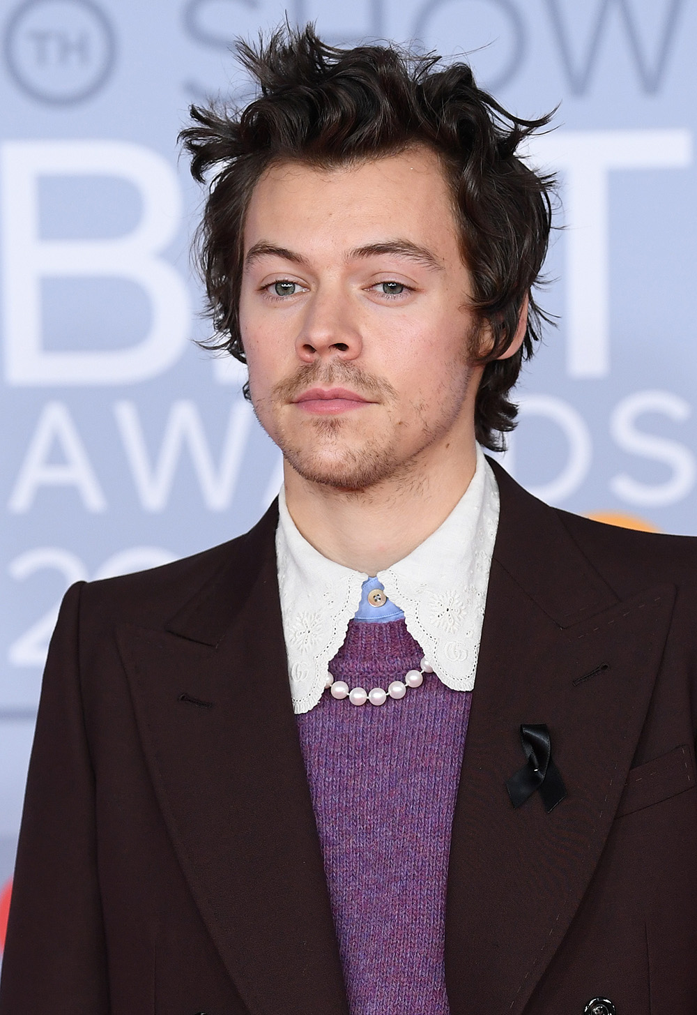 Harry Styles' new haircut is a call back to another era