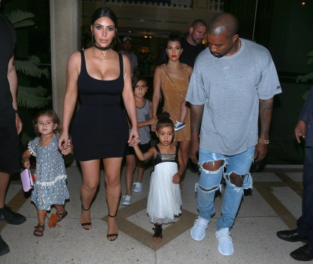 Kim Kardashian and Kourtey take the family to dinner at a house in cuba as she wears sexy dress and North holds a leaf in hand. Kourtney was holding onto her children too as she walked with Kanye West to the final dinner night of their trip to Cuba.Pictured: Kim Kardashian,Kourtney Kardashian,Kim KardashianKourtney KardashianRef: SPL1276773 060516 NON-EXCLUSIVEPicture by: SplashNews.comSplash News and PicturesLos Angeles: 310-821-2666New York: 212-619-2666London: +44 (0)20 7644 7656Berlin: +49 175 3764 166photodesk@splashnews.comWorld Rights