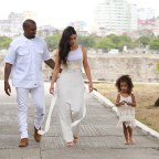 Kim Kardashian has a romantic walk with Kanye and North, as Kourtney spends quality time with her children in Cuba