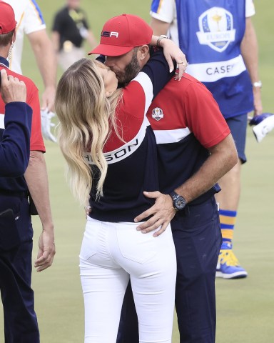 The US team's Dustin Johnson (R) gets a kiss from his wife Paulina Gretzky (L) after winning his match during the Singles matches on the final day of the pandemic-delayed 2020 Ryder Cup golf tournament at the Whistling Straits golf course in Kohler, Wisconsin, USA, 26 September 2021. 2020 Ryder Cup golf tournament, Kohler, USA - 26 Sep 2021