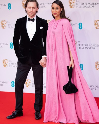 Zawe Ashton and Tom Hiddleston pose for photographers upon arrival at the 75th British Academy Film Awards, BAFTA's, in LondonBafta Film Awards 2022 Arrivals, London, United Kingdom - 13 Mar 2022
