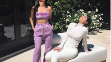 kourtney kardashian purple outfit flaunts abs