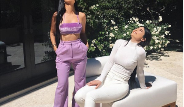 kourtney kardashian purple outfit flaunts abs