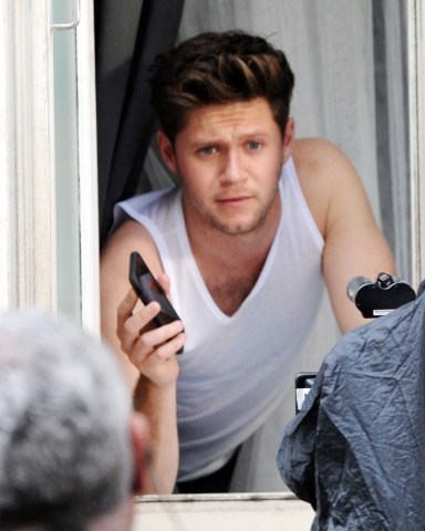 ** RIGHTS: ONLY UNITED STATES, BRAZIL, CANADA ** London, UNITED KINGDOM  - *EXCLUSIVE* Former One Direction turned solo artist Niall Horan and the sexy Australian glamour model Georgia Mae Gibbs are seen filming together in London.

Niall and Georgia were on the set of Niall's much anticipated new single filming his new music video with machines filling the air with smoke creating a moody scene as a stylish Niall struts his stuff for the cameras wearing a suit and in one scene wearing his white vest top. *Shot on 09/16/19*

Pictured: Niall Horan

BACKGRID USA 17 SEPTEMBER 2019 

BYLINE MUST READ: #OVOWAZZA / BACKGRID

USA: +1 310 798 9111 / usasales@backgrid.com

UK: +44 208 344 2007 / uksales@backgrid.com

*UK Clients - Pictures Containing Children
Please Pixelate Face Prior To Publication*