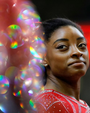 Simone Biles Hits a Home Run In Astros Jersey, Shorts & Converse Shoes –  Footwear News