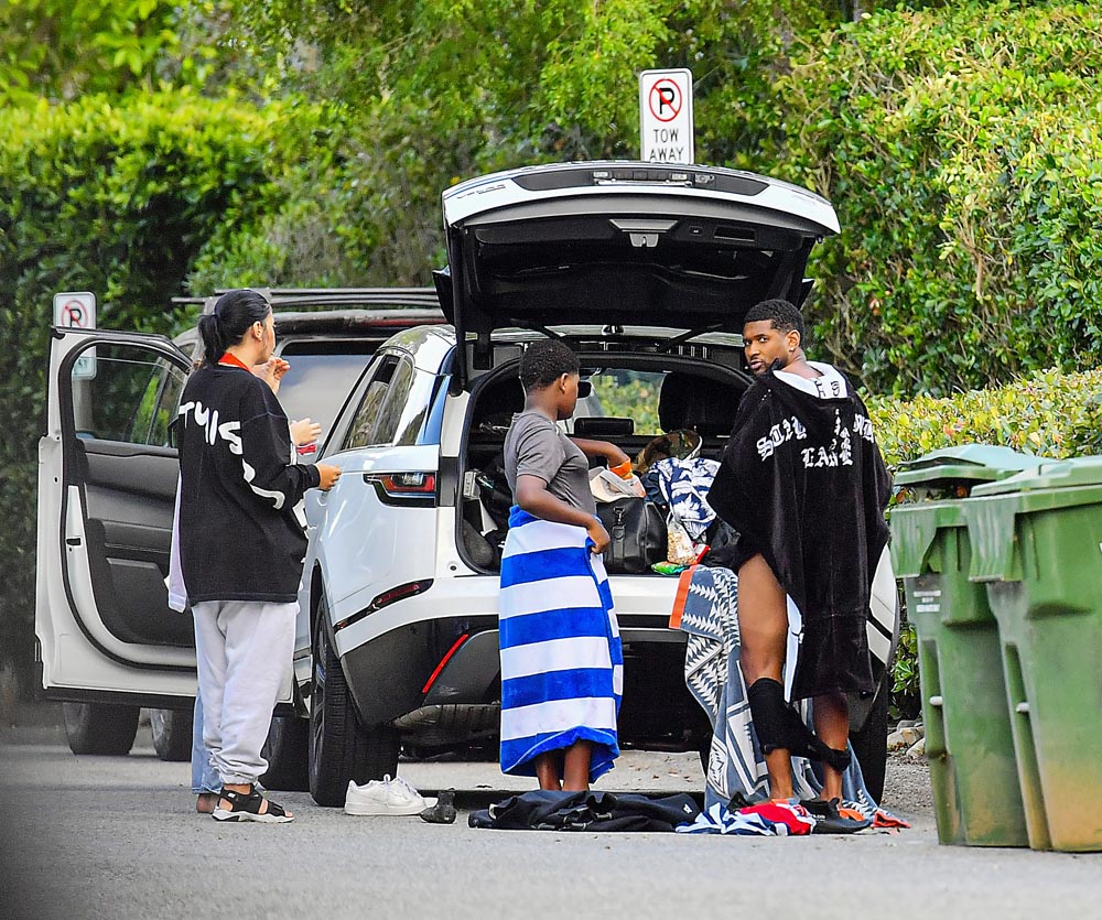 EXCLUSIVE: Usher is spotted changing his underwears in public after after a beach day in Malibu, CA.