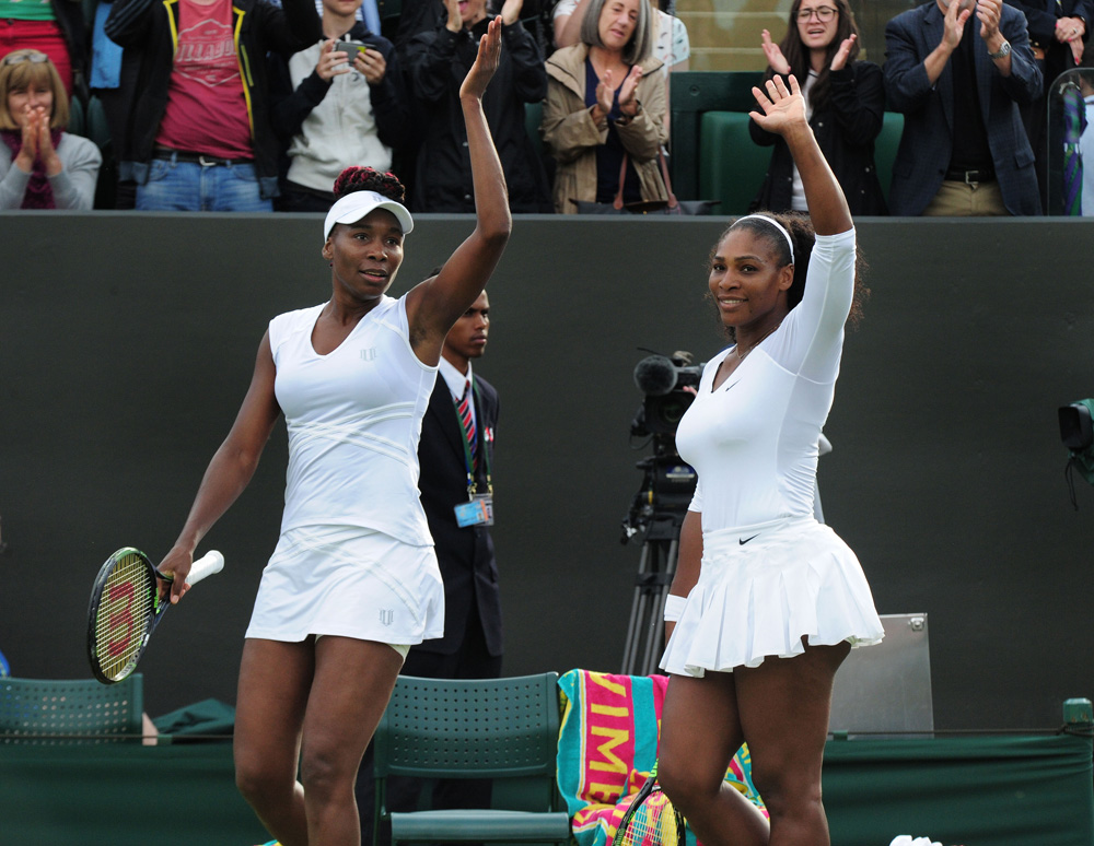 Tennis - 2016 Wimbledon Championships - Week One Thursday (Day four) Womens Doubles Round Two Venus and Serena Williams (USA) v Andreja Klepac and Katarrina Srebotnik (SLO) Venus and Serena Williams celebrate winning the match on court no 3
Wimbledon Championships