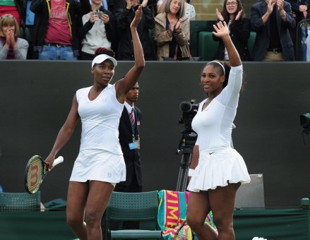 Tennis - 2016 Wimbledon Championships - Week One Thursday (Day four) Womens Doubles Round Two Venus and Serena Williams (USA) v Andreja Klepac and Katarrina Srebotnik (SLO) Venus and Serena Williams celebrate winning the match on court no 3
Wimbledon Championships