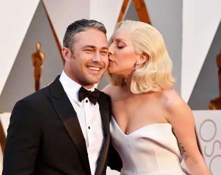 (L-R) Taylor Kinney and Lady Gaga attend the 88th Academy Awards in Los Angeles, CA, USA, February 28, 2016. Photo by Lionel Hahn/Sipa USA