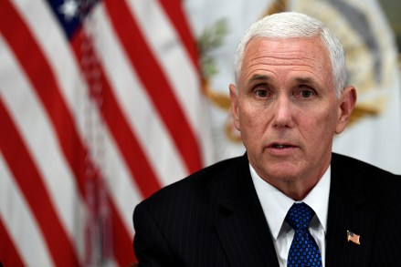 Vice President Mike Pence speaks during a meeting in the Vice President's Ceremonial Office on the White House complex in Washington, with family members of the six Citgo executives currently detained in Venezuela
Trump US Venezuela, Washington, USA - 02 Apr 2019