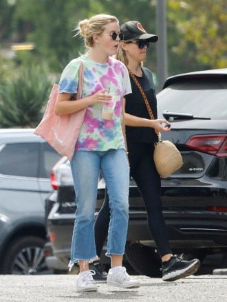 Malibu, CA  - *EXCLUSIVE*  - Reese Witherspoon stops at SunLife Organics for breakfast with her daughter Ava. The 'Big Little Lies' actress was casual in black athletic gear, while her mini-me daughter sported a colorful tie-dye shirt and jeans.Pictured: Reese Witherspoon, Ava Elizabeth PhillippeBACKGRID USA 22 SEPTEMBER 2019 USA: +1 310 798 9111 / usasales@backgrid.comUK: +44 208 344 2007 / uksales@backgrid.com*UK Clients - Pictures Containing ChildrenPlease Pixelate Face Prior To Publication*