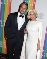 Taylor Kinney and Lady Gaga attend the 37th Annual Kennedy Center Honors at The Kennedy Center Hall of States, in Washington
2014 Kennedy Center Honors - Arrivals, Washington, USA