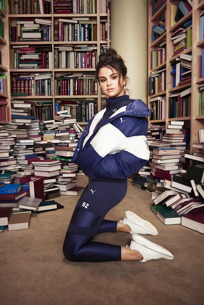 Selena Gomez poses with books for Puma