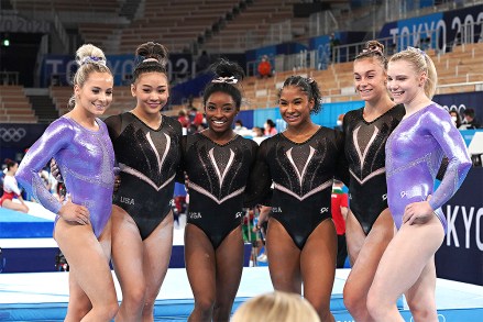 United States Artistic Gymnasts Simone Biles, center, poses for a group photo after their practice session at Ariake Gymnastics Center before the start of the Tokyo Olympic Games in Tokyo, Japan, on Thursday July 22, 2021. Standing from left to right are: Mykayla Skinner, Sunisa Lee, Simone Biles, Jordan Chiles, Grace McCallum and Jade Carey.  Tokyo Olympics, Japan - 22 Jul 2021