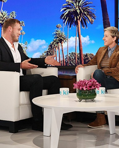 In this photo released by Warner Bros., talk show host Ellen DeGeneres is seen during a taping of "The Ellen DeGeneres Show" at the Warner Bros. lot in Burbank, Calif. (Photo by Michael Rozman/Warner Bros.)