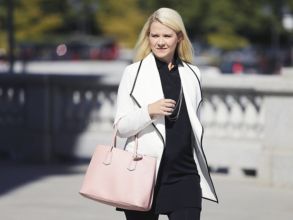 FILE - In this Sept. 13, 2018, file photo, Elizabeth Smart arrives for a news conference in Salt Lake City. Utah kidnapping and rape survivor Smart says she was sexually assaulted on an airplane last year. Smart said on "CBS This Morning" Thursday, Feb. 6, 2020, that she was sleeping when she felt someone's hand rubbing her inner thigh. She says the last time someone touched her without permission was when she was kidnapped as a 14-year-old girl. (AP Photo/Rick Bowmer, File)