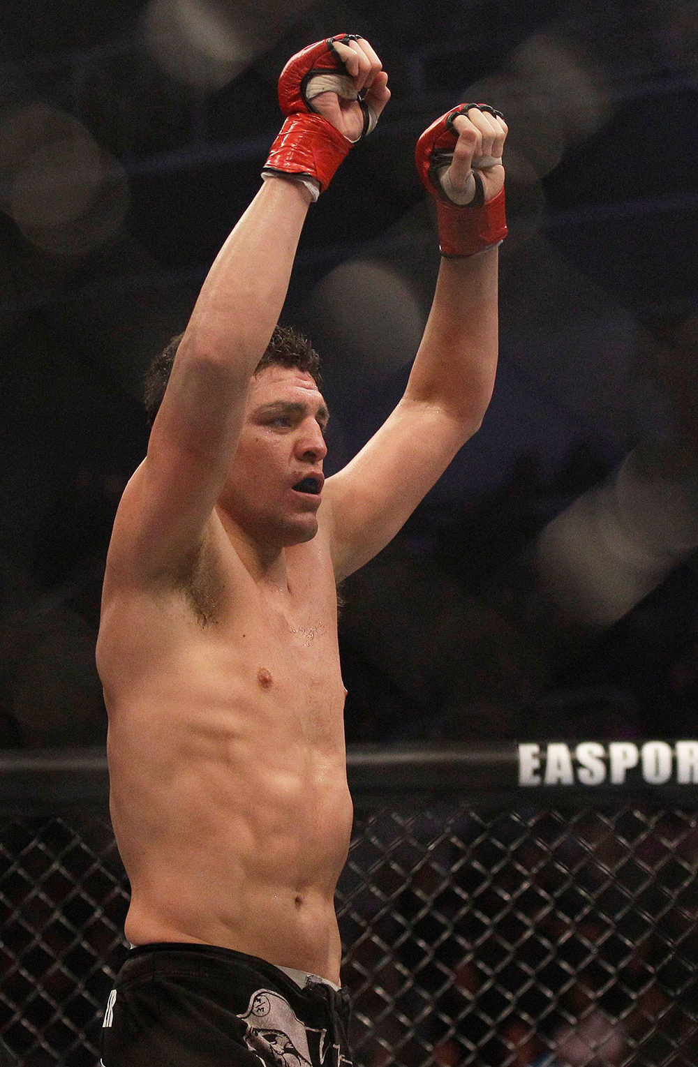 Nick Diaz Nick Diaz celebrates after beating Evangelista "Cyborg" Santos, from Brazil, in a Strikeforce Welterweight Championship mixed martial arts fight in San Jose, Calif., . Diaz won by submission in the second round to retain his championship
Strikeforce Mixed Martial Arts, San Jose, USA